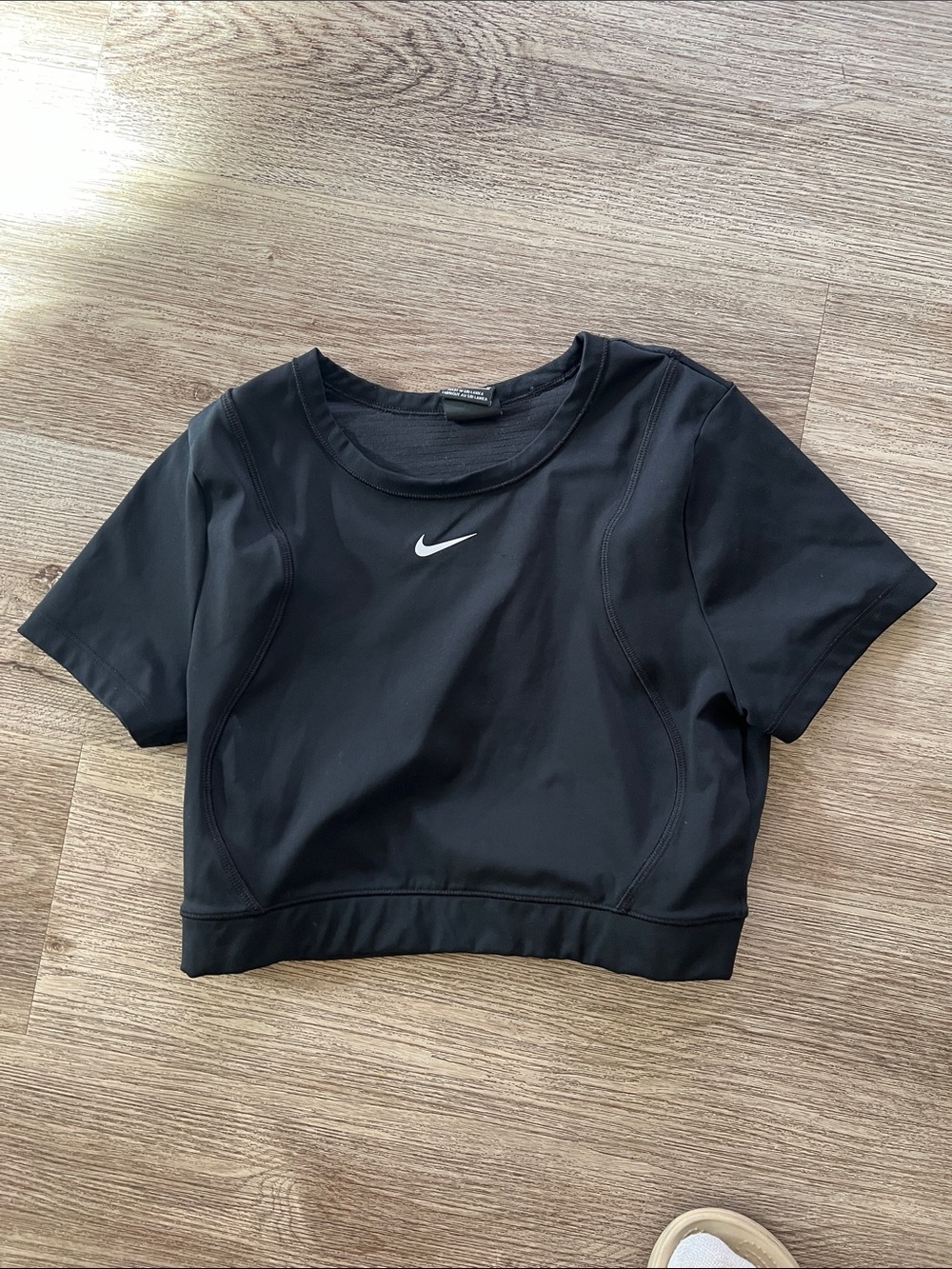 Nike Black Cropped Athletic Tee with White Swoosh